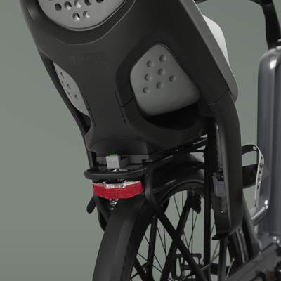 Siège vélo pour enfant Thule Yepp 2 Maxi MIK HD monté en porte-bagages 